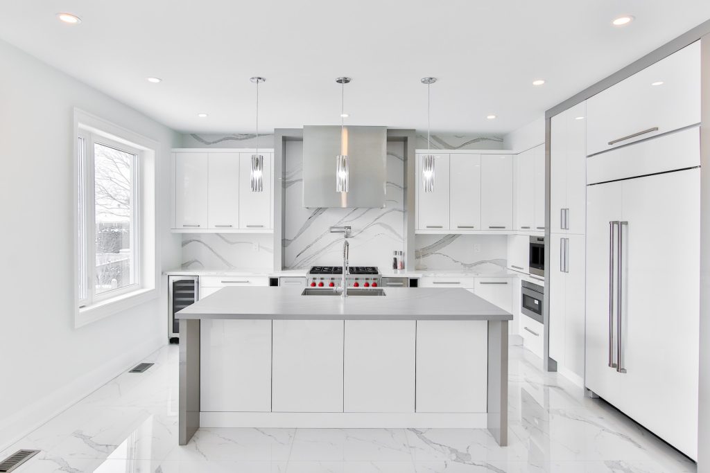 white wooden kitchen cabinet with mirror